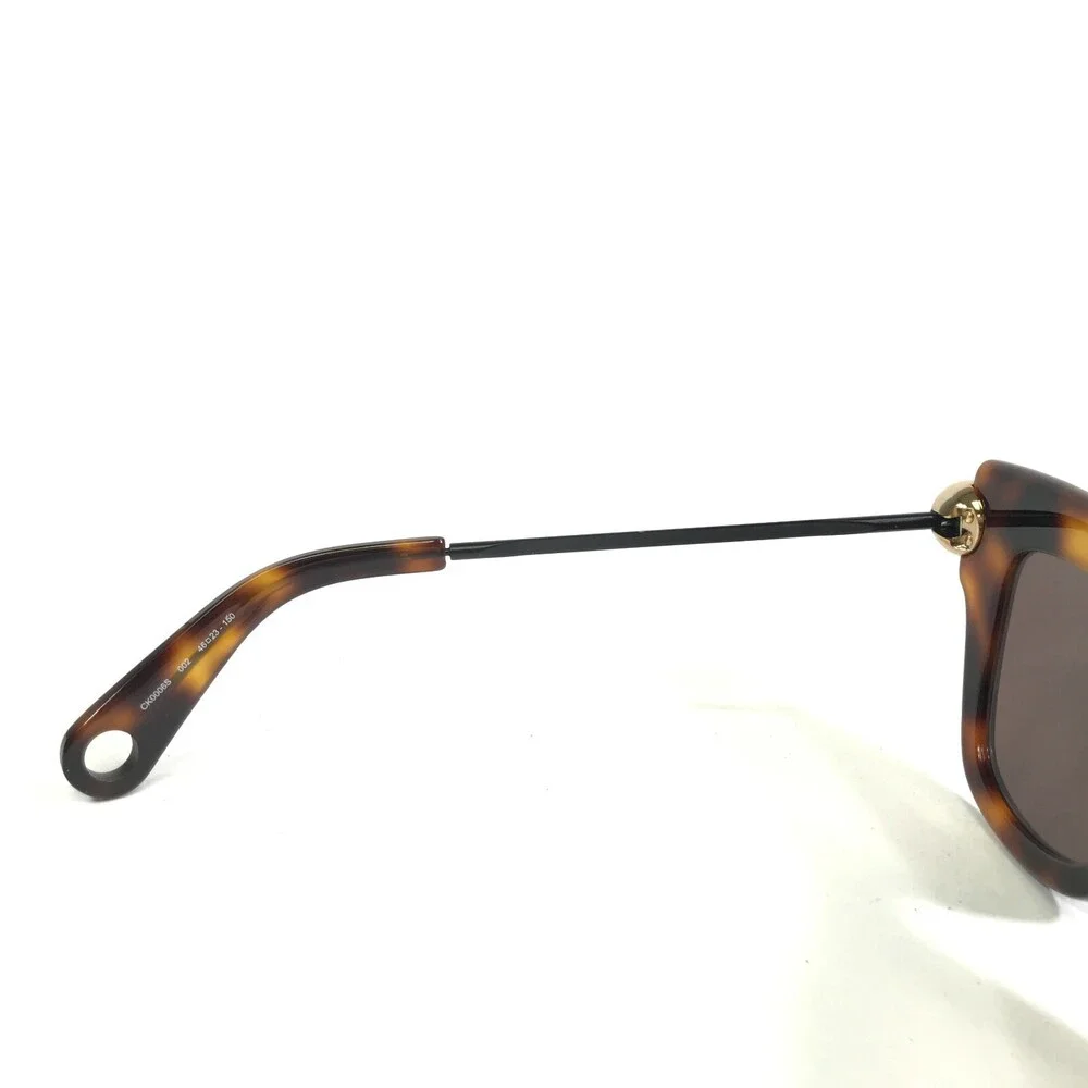 Christopher Kane Sunglasses CK0006S 002 Gold Tortoise Frames with Purple Lenses